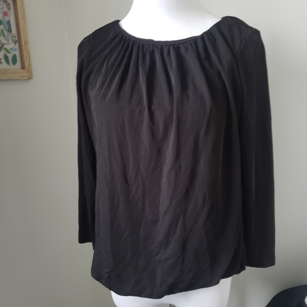 Solid black blouse with gold hardware, 3/4 length